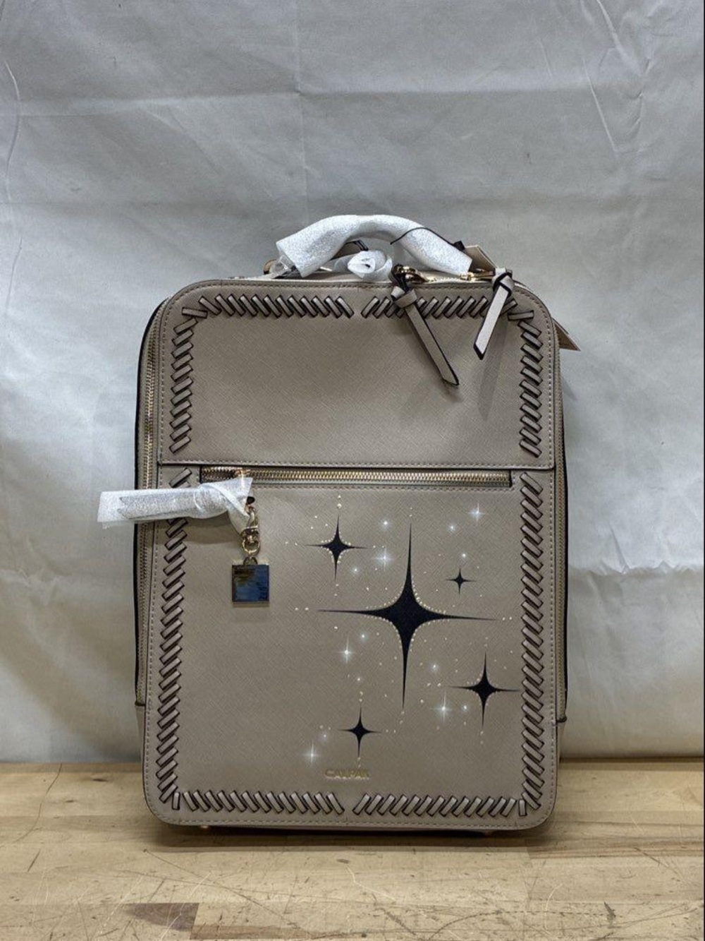 Calpak Kaya 15in Laptop Backpack with Starburst Design